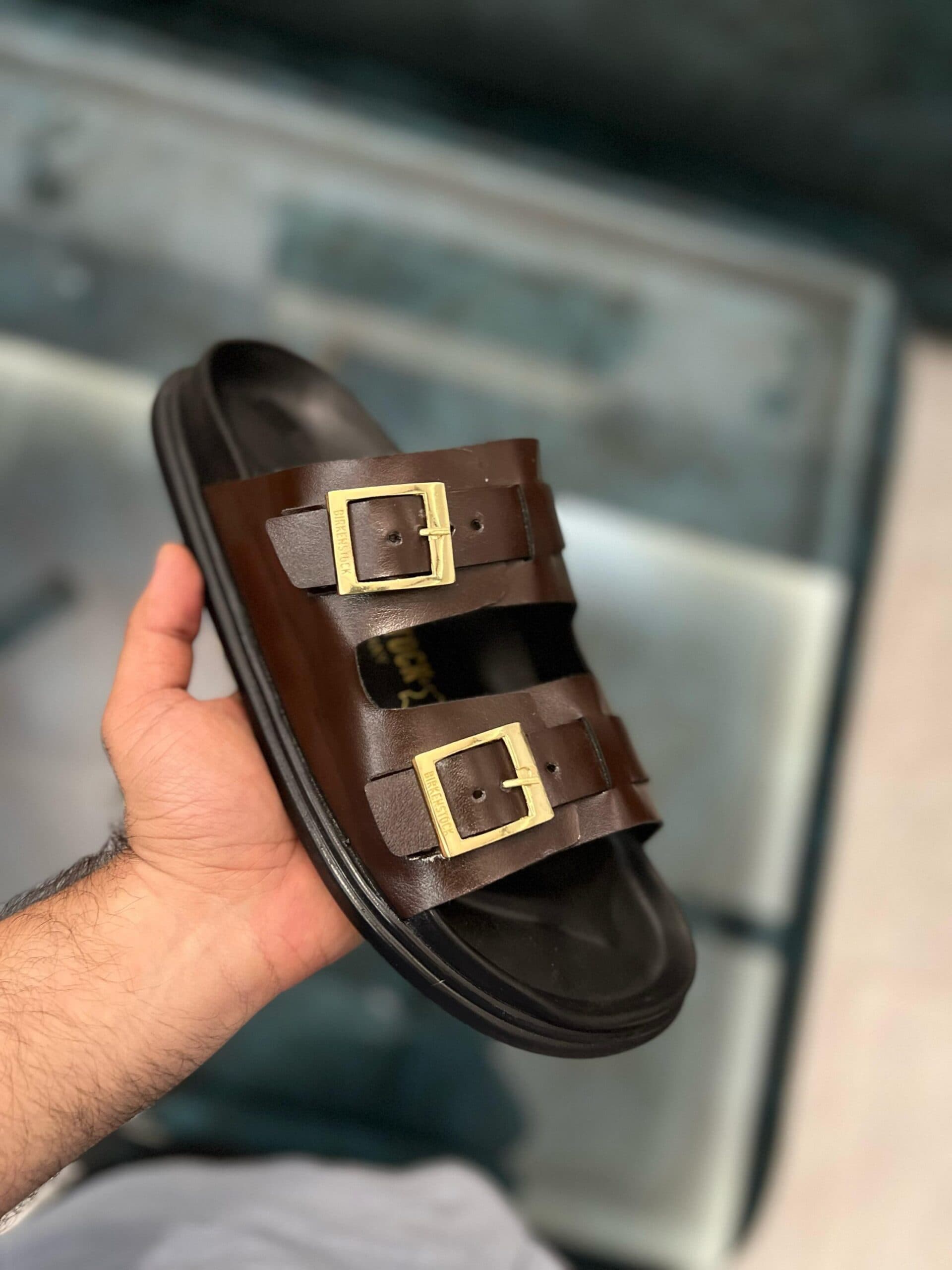 Birkenstock Arizona Oiled Leather Sandals in Dark Brown with Gold Buckles